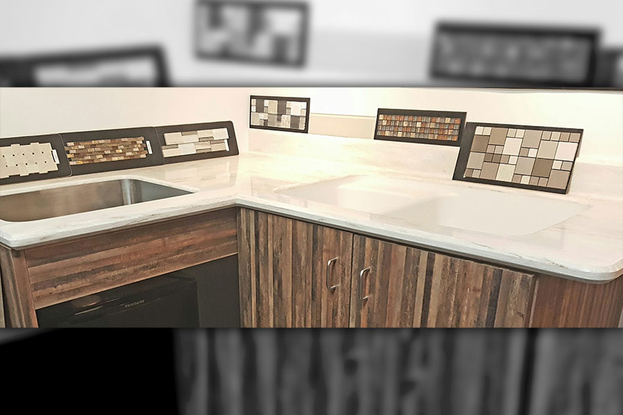 A solid surface countertop with a single stainless-steel sink and a variety of tile backsplash options in Springfield, IL.