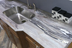 A laminate countertop with a granite-looking surface installed in a residential kitchen in Glenarm, IL.