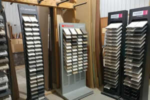 A wall of countertop options for customers to choose from at Ray’s Countertop Shop in Glenarm, IL. Countertop options for RVs and campers.