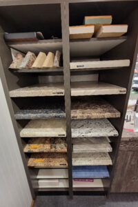 A shelf with laminate countertop profiles and edges available for installation from Ray’s Countertop Shop in Central Illinois.