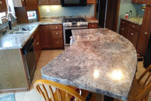 A newly installed laminate countertop for a kitchen island in Springfield, IL. A residential laminate countertop custom made for a kitchen island.