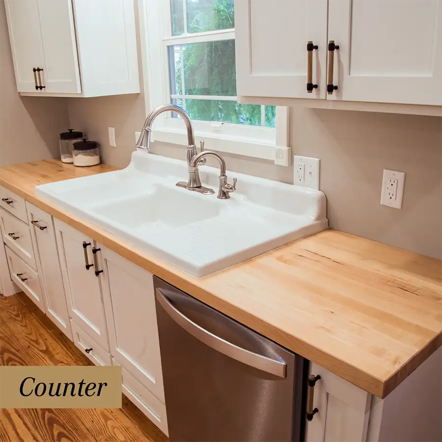 Bally Block - Wood Welded maple countertop in simple modern kitchen with white laminate cabinets - Springfield, IL
