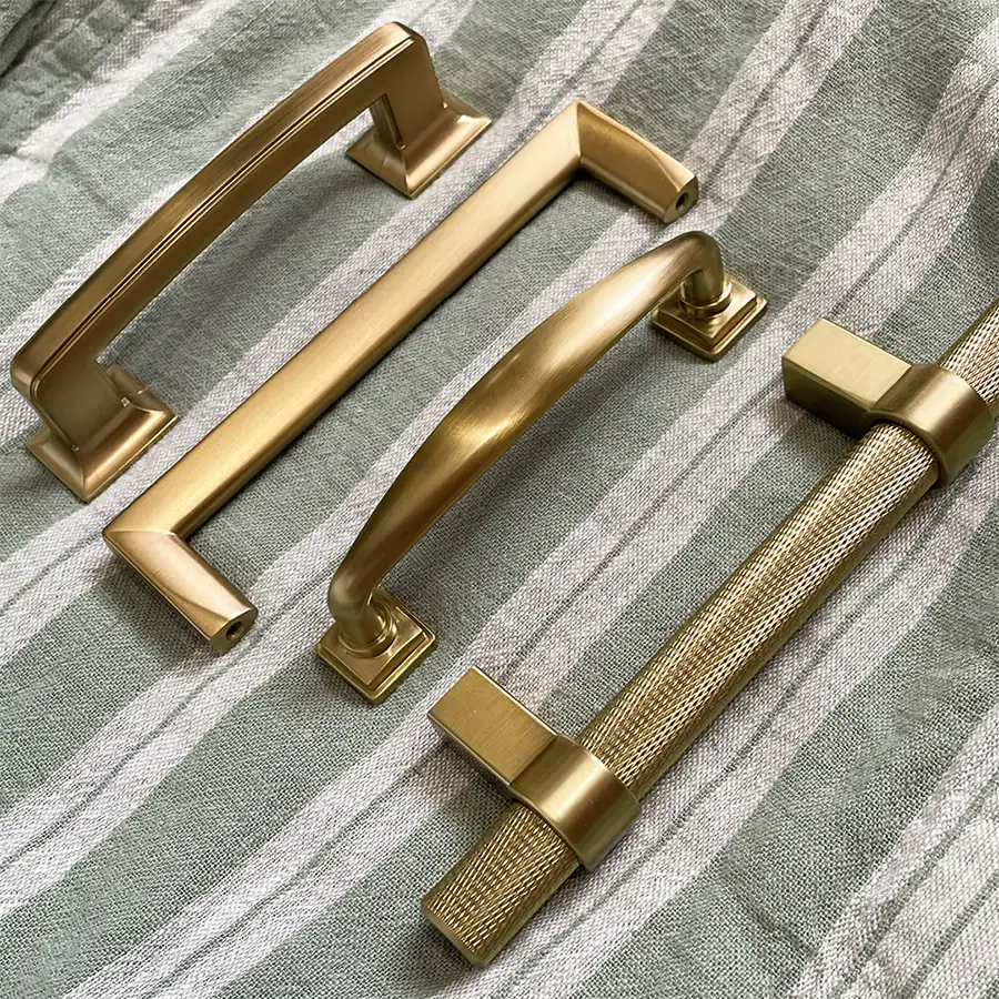 Berenson Hardware - miscellaneous brushed gold items, pulls for cabinets - Springfield, IL