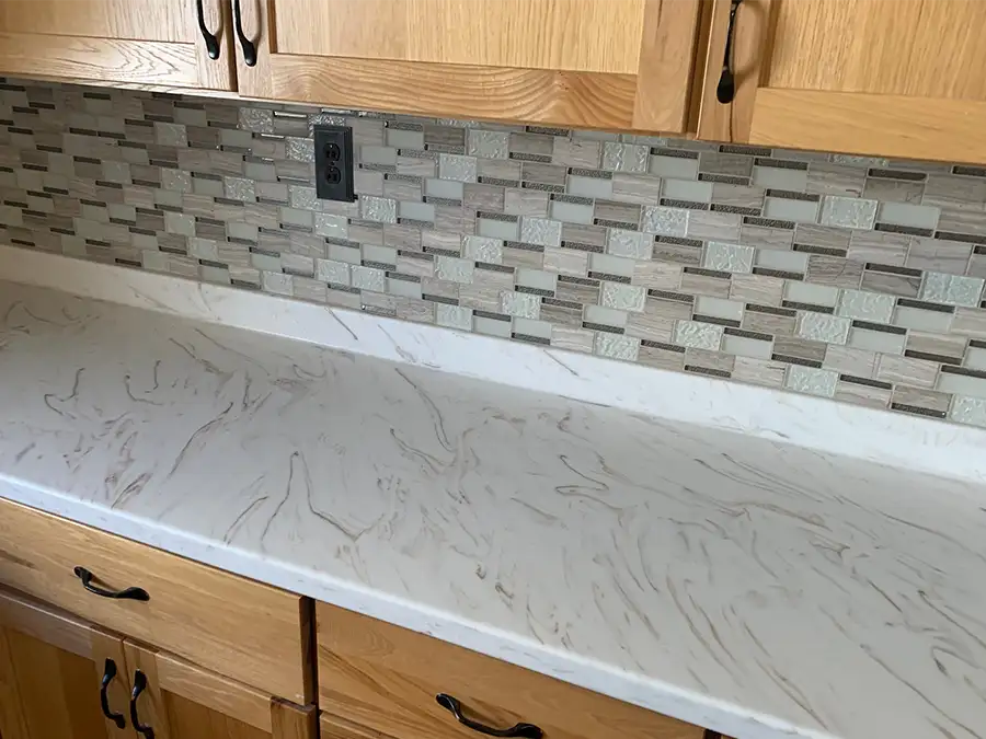 Ray's Countertop Shop Inc. - past projects, customer review - neutral color backsplash in warm kitchen with laminate countertops - Springfield, IL