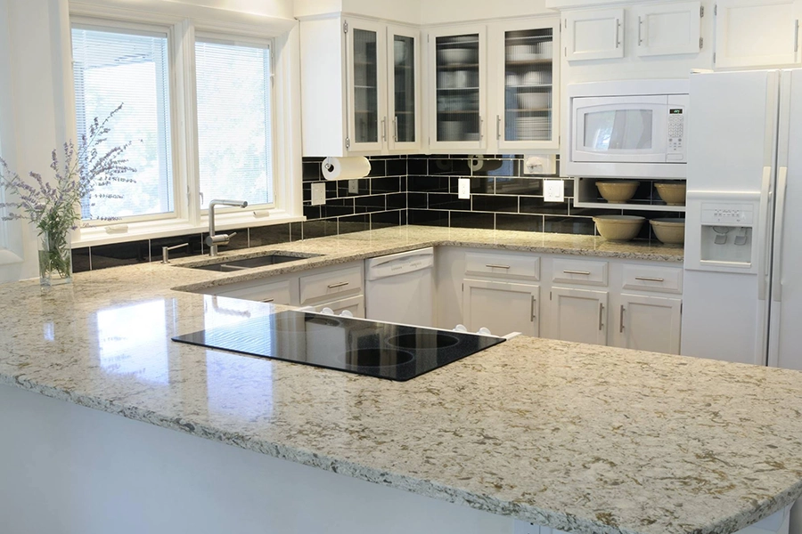 Light color quartz custom-made American fabricated countertops in the kitchen of a Springfield, IL home.