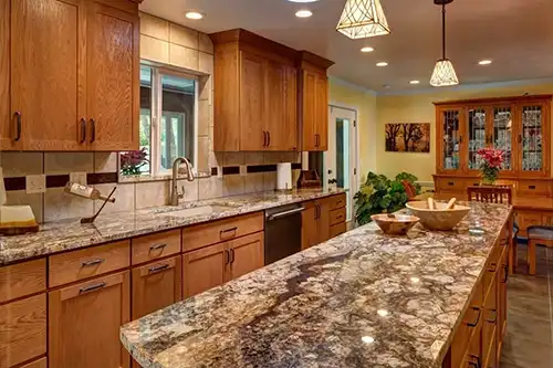 RAY'S COUNTERTOP SHOP INC. - Brown granite countertops in the home of a Springfield IL, resident.